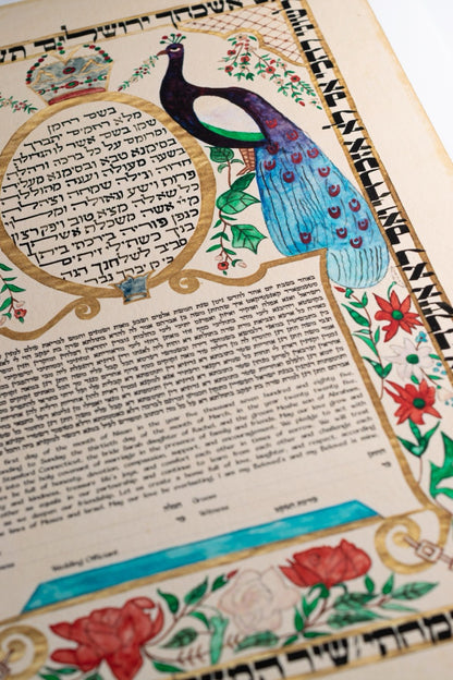 Historic ketubah from Bombay, India dated 1911 with peacock illustration and decorative Jewish wedding contract artwork.