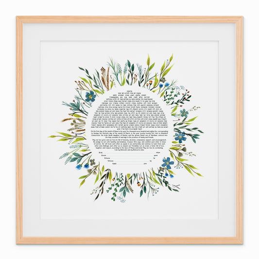 Watercolor Wildflower Ketubah by Sara Goldberg featuring hand-painted blue, green, yellow, and rust wildflowers surrounding the ketubah text.